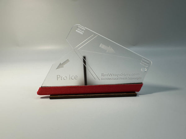 Acrylic squeegee with a red microfiber felt surface, featuring guide arrows and a lanyard hole, positioned on a white background.