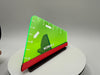 Triangular green and red card with 'WORKER A' printed on it, placed on a white stand against a gray background.