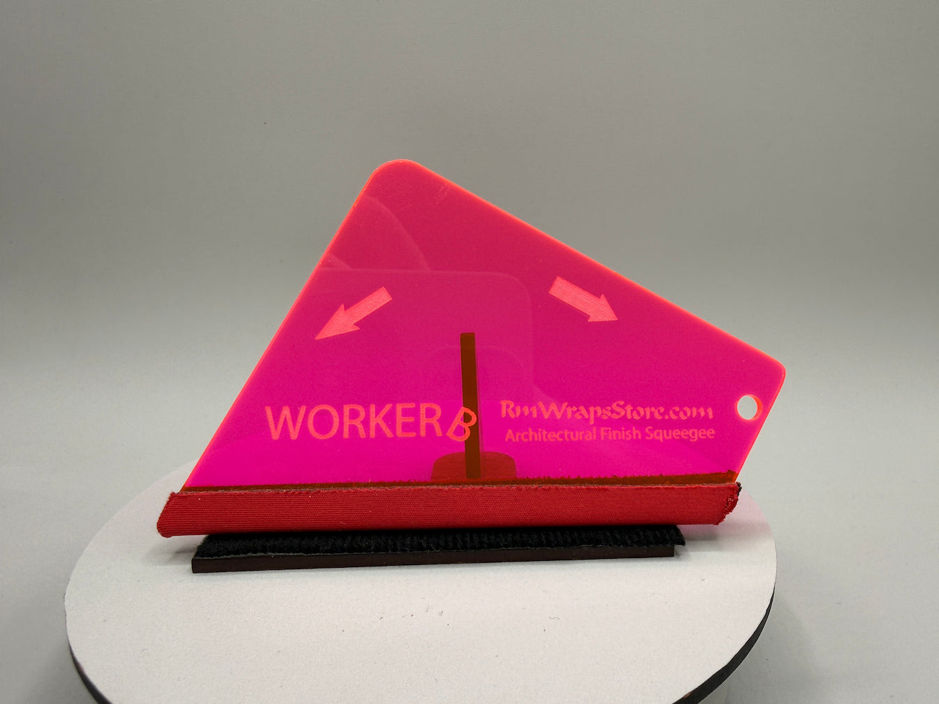Pink and red architectural square tool with 'WORKER' branding on a gray background