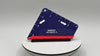 Blue and red tool with 'RMWRAPS' branding on a gray background