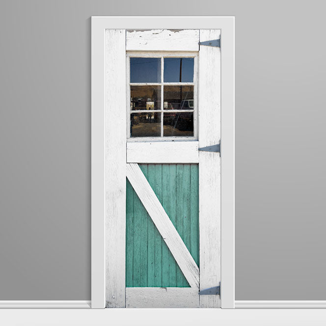 White-framed door with teal panel on a gray background