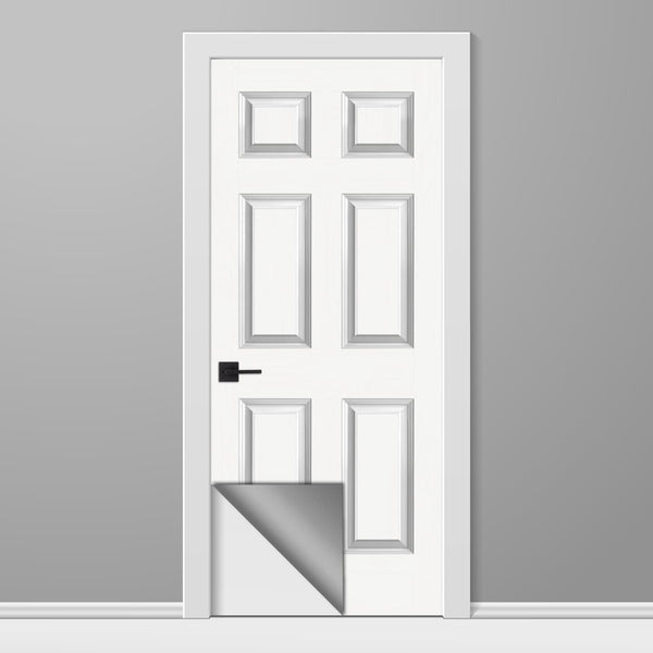 White door with a black handle on a gray background