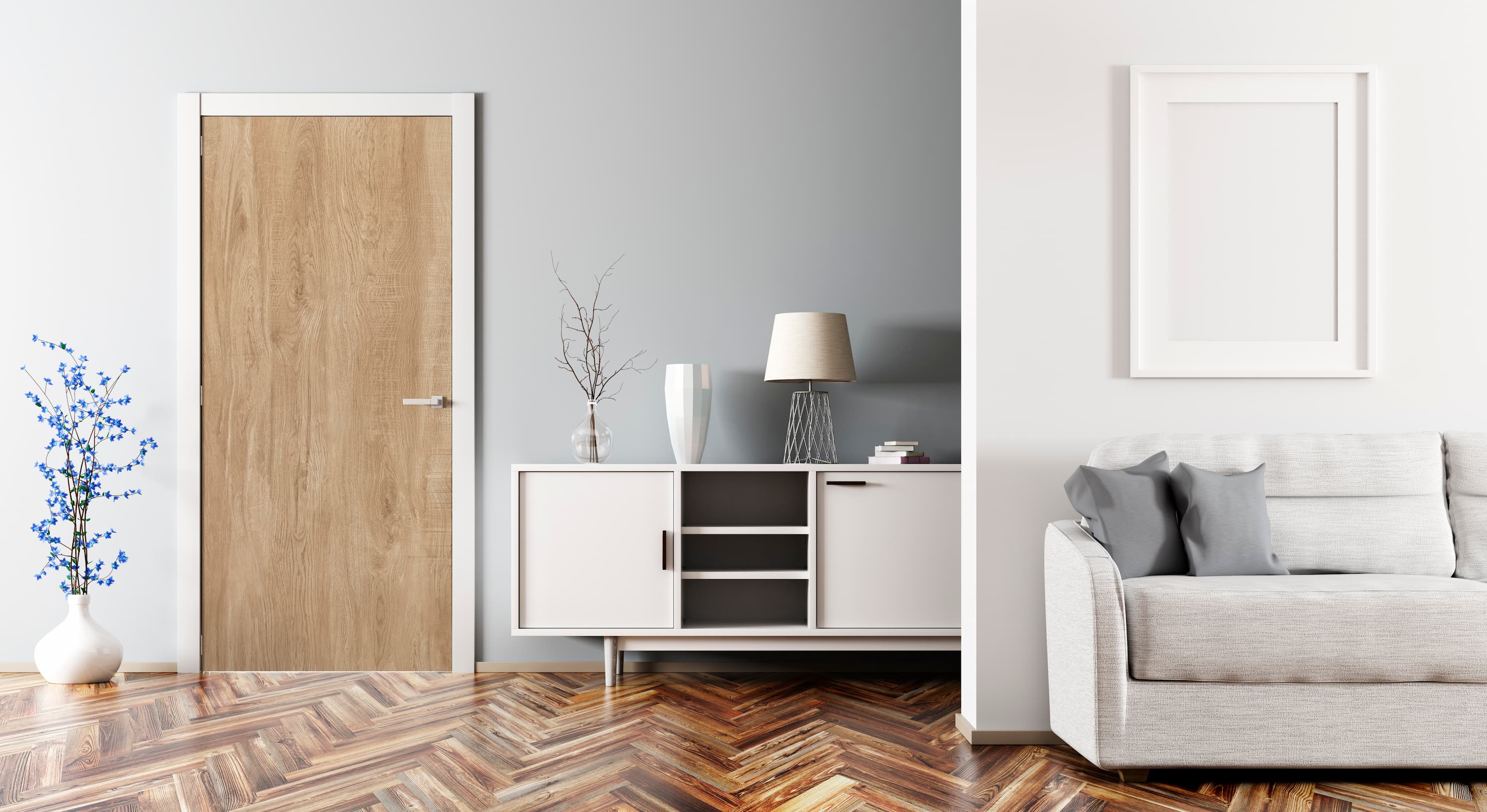 Modern living room with a wooden door, white cabinet, and gray sofa.